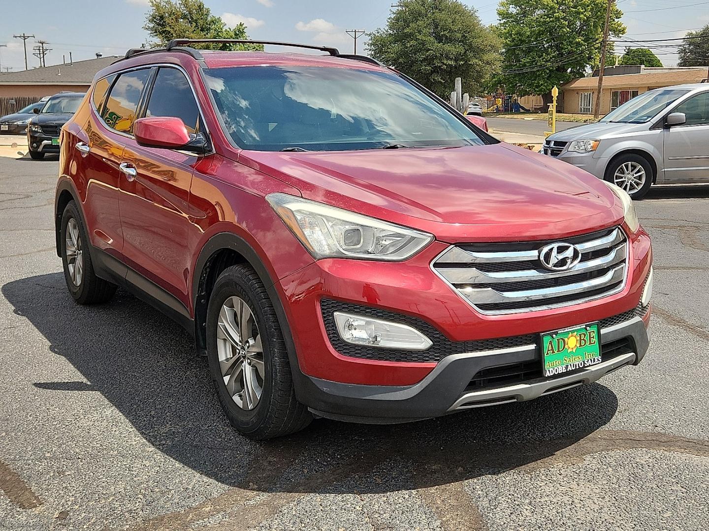 2014 RED Hyundai Santa Fe Sport 2.4L (5XYZU3LB9EG) with an Theta II 2.4L I-4 gasoline direct injection, DOHC, variable valve control, regular unleaded, engine with 190HP engine, located at 4711 Ave Q, Lubbock, TX, 79412, (806) 687-2362, 33.551304, -101.855293- Photo#5