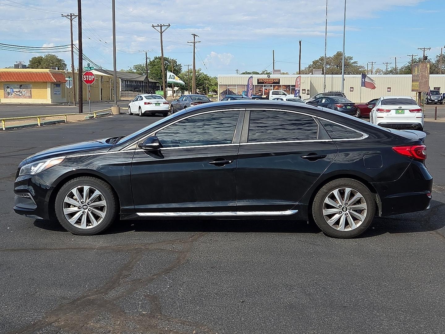2015 Phantom Black - S3 /Gray - GG Hyundai Sonata Sport (5NPE34AFXFH) with an 2.4L I-4 gasoline direct injection, DOHC, variable valve control, regular unleaded, engine with 185HP engine, located at 4711 Ave Q, Lubbock, TX, 79412, (806) 687-2362, 33.551304, -101.855293- Photo#1