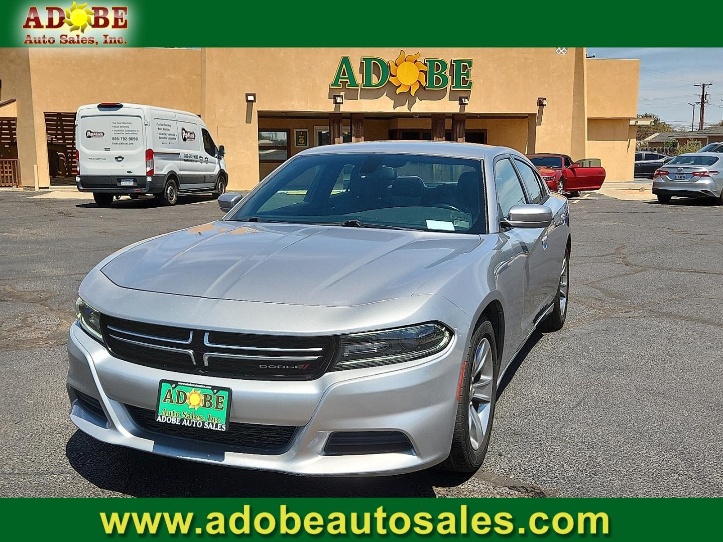 2015 SILVER /Black - X9 Dodge Charger SE (2C3CDXBG2FH) with an 3.6L V-6 DOHC, variable valve control, regular unleaded, engine with 292HP engine, located at 4711 Ave Q, Lubbock, TX, 79412, (806) 687-2362, 33.551304, -101.855293- Photo#0