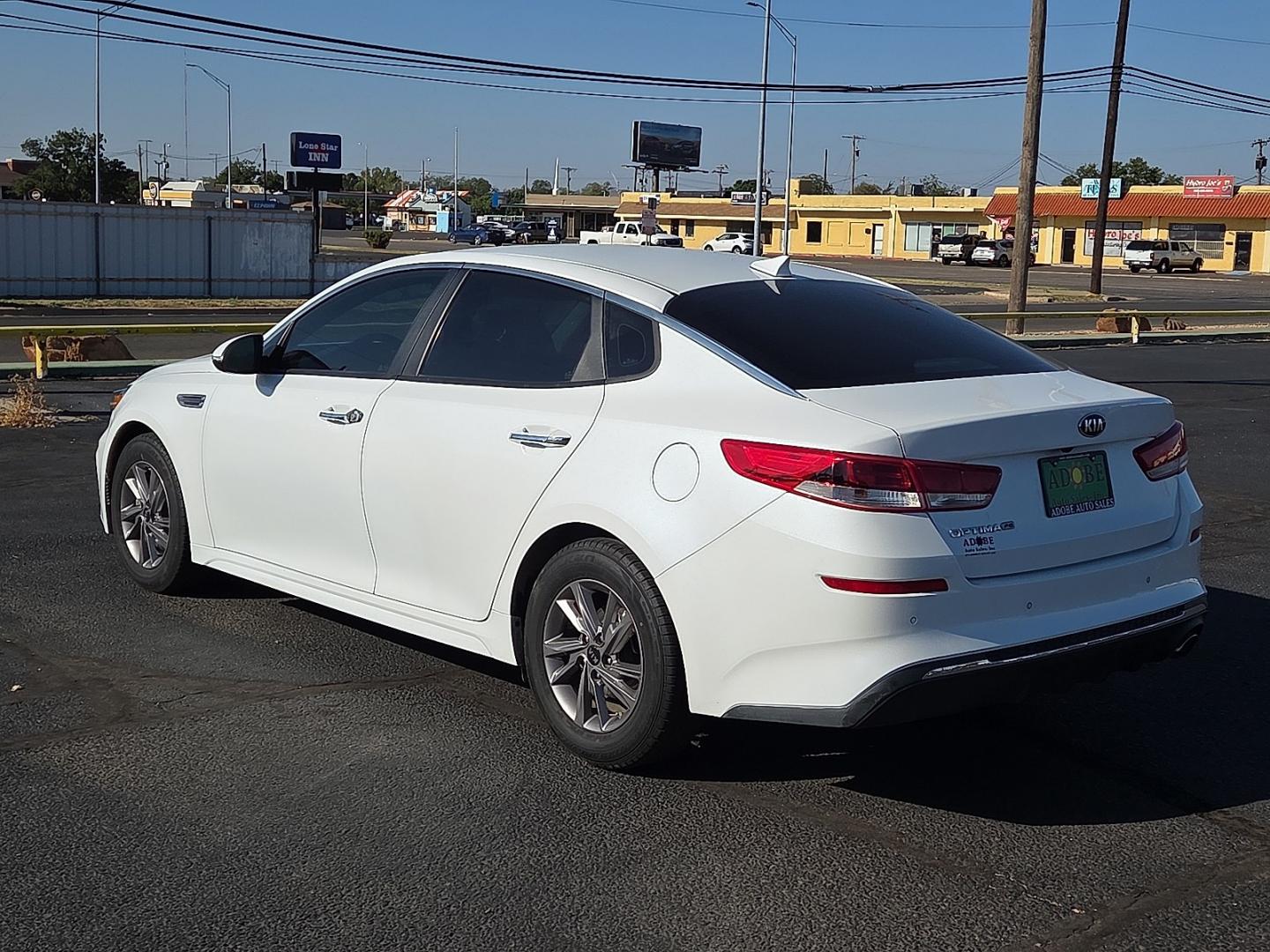2020 Snow White Pearl - SWP /Black - WK Kia Optima LX (5XXGT4L33LG) with an Theta II 2.4L I-4 gasoline direct injection, DOHC, D-CVVT variable valve control, regular unleaded, engine with 185HP engine, located at 4711 Ave Q, Lubbock, TX, 79412, (806) 687-2362, 33.551304, -101.855293- Photo#2