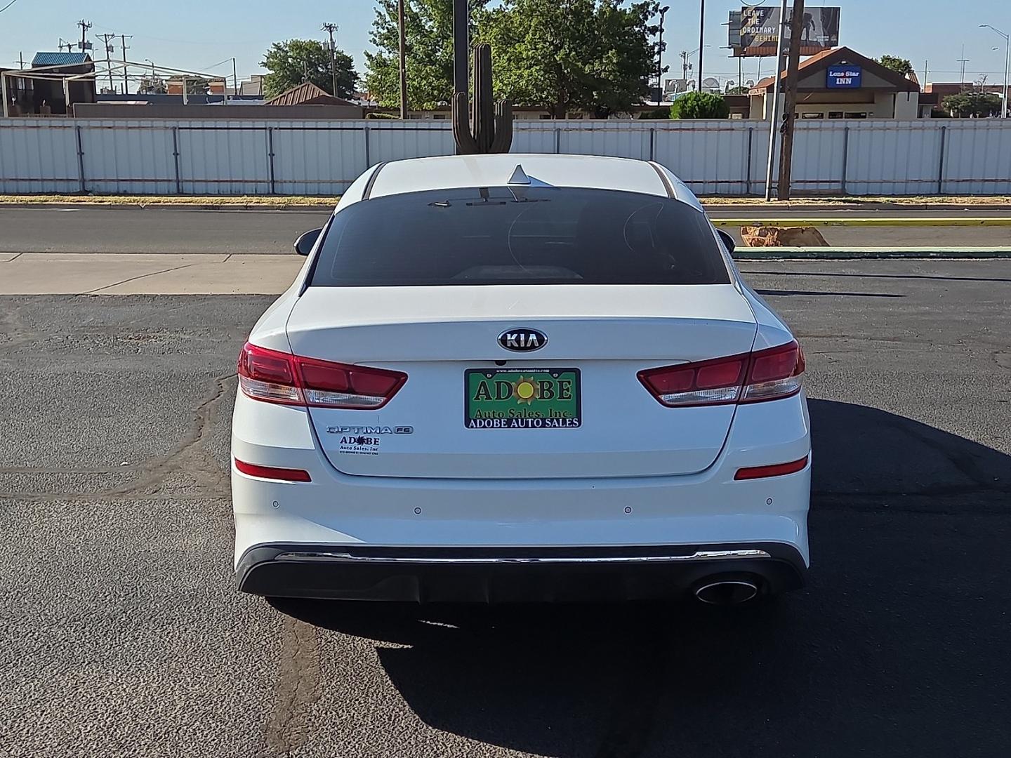 2020 Snow White Pearl - SWP /Black - WK Kia Optima LX (5XXGT4L33LG) with an Theta II 2.4L I-4 gasoline direct injection, DOHC, D-CVVT variable valve control, regular unleaded, engine with 185HP engine, located at 4711 Ave Q, Lubbock, TX, 79412, (806) 687-2362, 33.551304, -101.855293- Photo#3