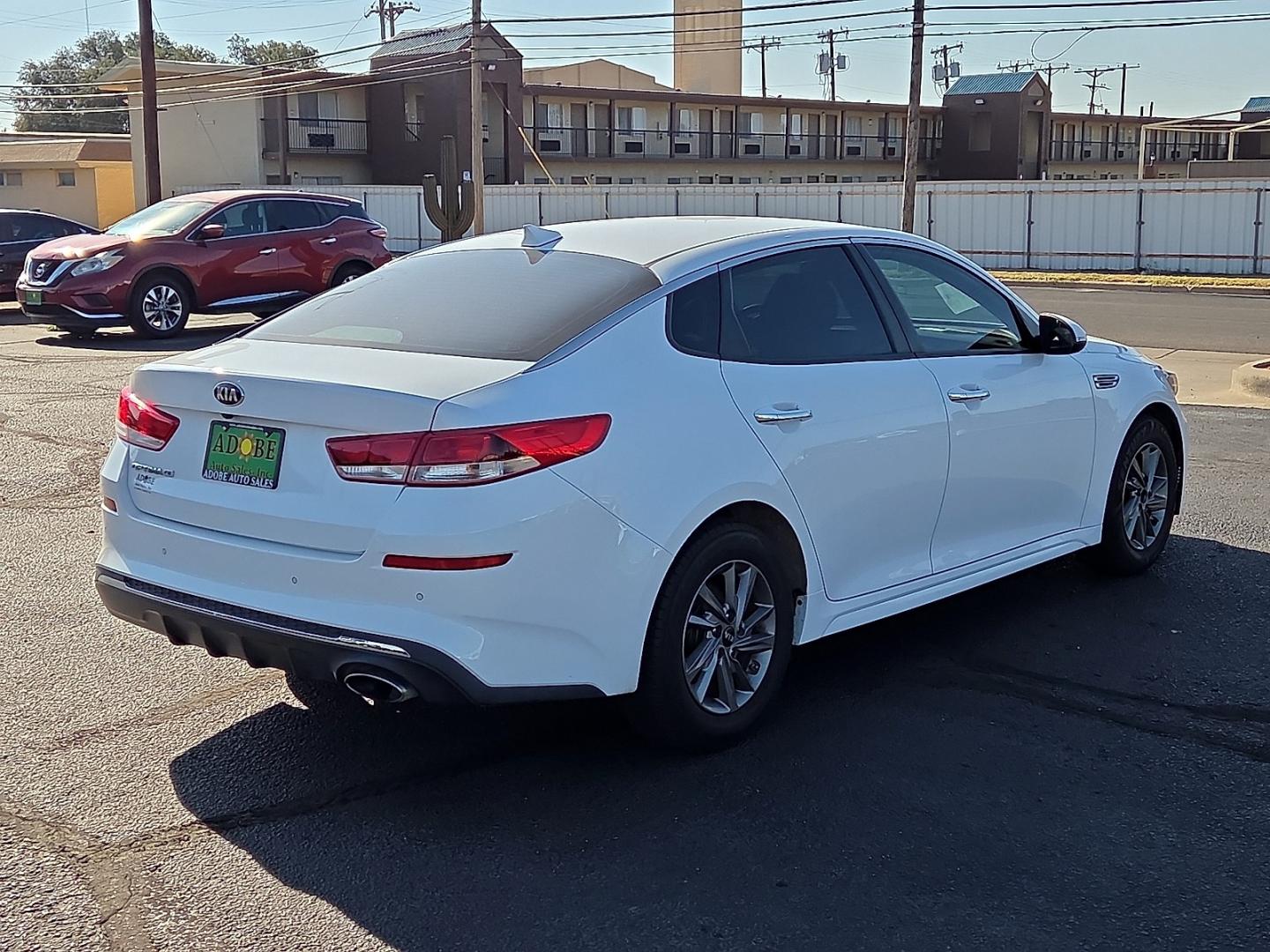 2020 Snow White Pearl - SWP /Black - WK Kia Optima LX (5XXGT4L33LG) with an Theta II 2.4L I-4 gasoline direct injection, DOHC, D-CVVT variable valve control, regular unleaded, engine with 185HP engine, located at 4711 Ave Q, Lubbock, TX, 79412, (806) 687-2362, 33.551304, -101.855293- Photo#4