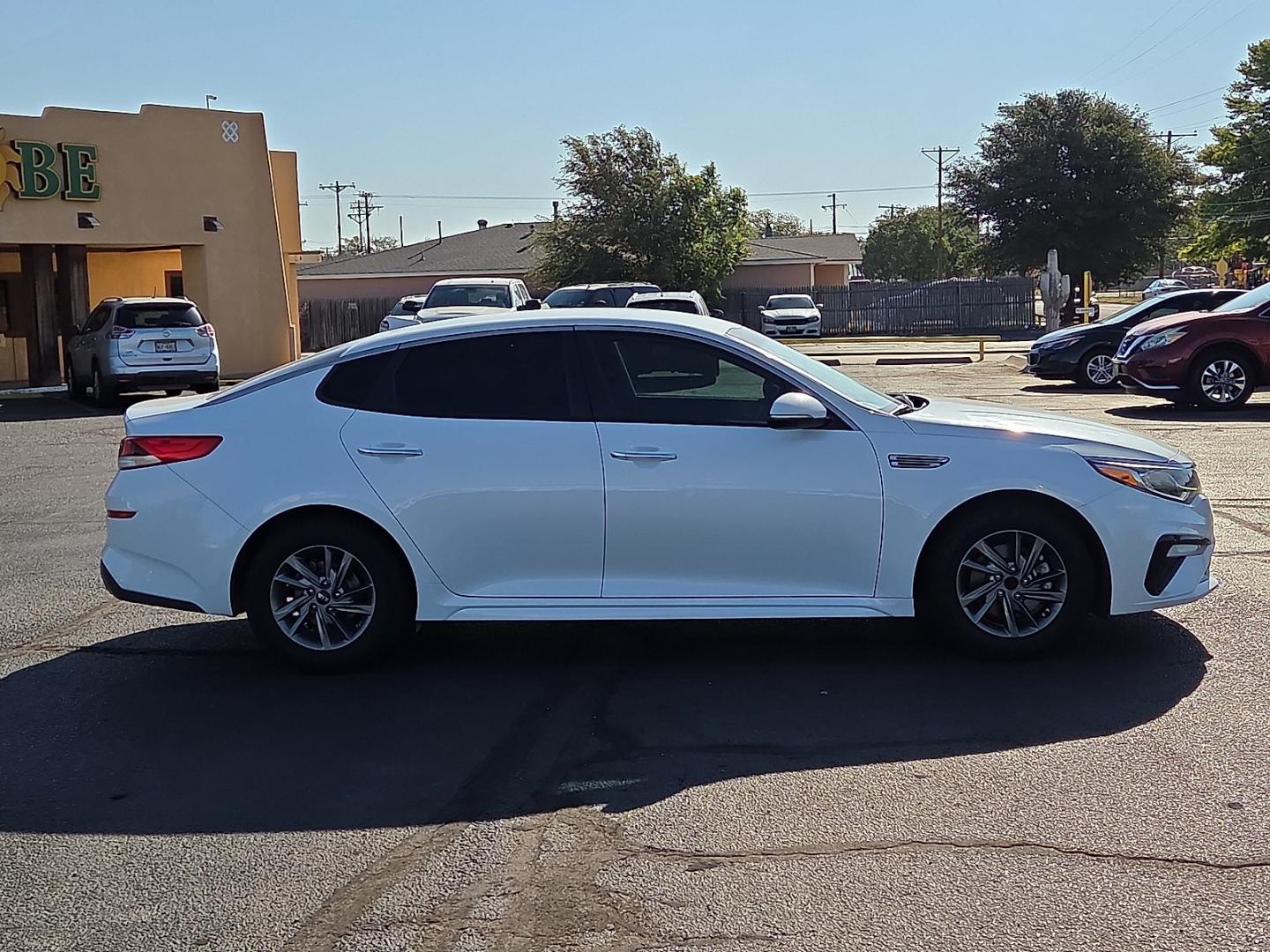 2020 Snow White Pearl - SWP /Black - WK Kia Optima LX (5XXGT4L33LG) with an Theta II 2.4L I-4 gasoline direct injection, DOHC, D-CVVT variable valve control, regular unleaded, engine with 185HP engine, located at 4711 Ave Q, Lubbock, TX, 79412, (806) 687-2362, 33.551304, -101.855293- Photo#5