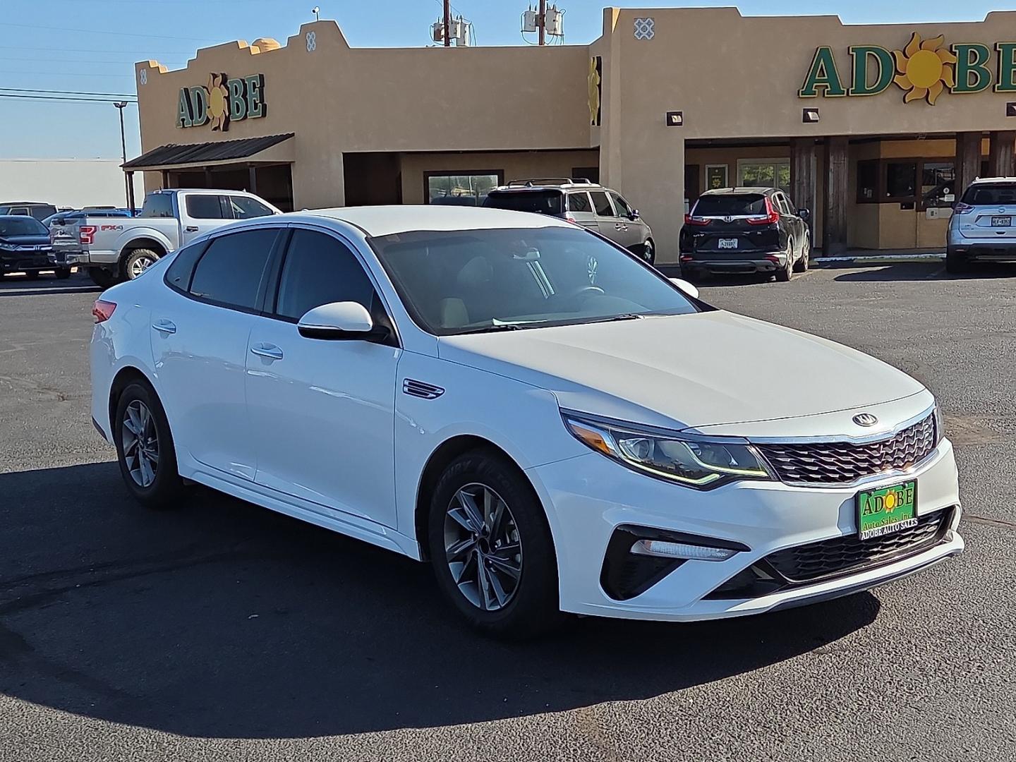 2020 Snow White Pearl - SWP /Black - WK Kia Optima LX (5XXGT4L33LG) with an Theta II 2.4L I-4 gasoline direct injection, DOHC, D-CVVT variable valve control, regular unleaded, engine with 185HP engine, located at 4711 Ave Q, Lubbock, TX, 79412, (806) 687-2362, 33.551304, -101.855293- Photo#6