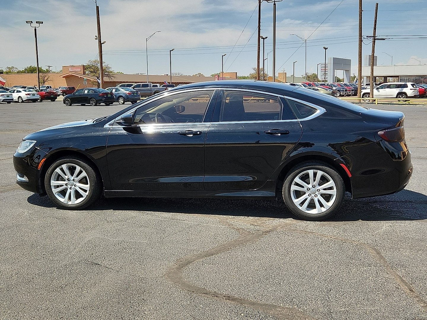 2015 Black Clearcoat - PX8 /Black - X9 Chrysler 200 Limited (1C3CCCAB3FN) with an 2.4L I4 MultiAir Engine engine, located at 4711 Ave Q, Lubbock, TX, 79412, (806) 687-2362, 33.551304, -101.855293- Photo#1