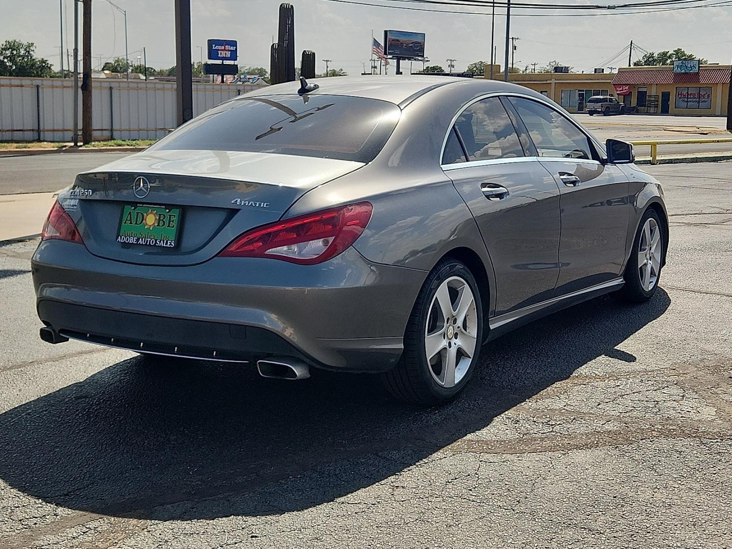2016 GRAY Mercedes-Benz CLA 250 4MATIC (WDDSJ4GB6GN) with an 2L I-4 direct injection, DOHC, variable valve control, intercooled turbo, premium gasoline, engine with 208HP engine, located at 4711 Ave Q, Lubbock, TX, 79412, (806) 687-2362, 33.551304, -101.855293- Photo#3