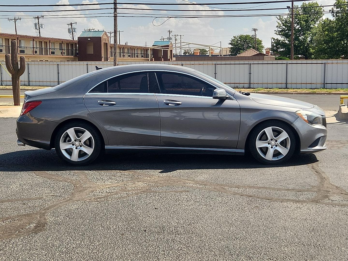 2016 GRAY Mercedes-Benz CLA 250 4MATIC (WDDSJ4GB6GN) with an 2L I-4 direct injection, DOHC, variable valve control, intercooled turbo, premium gasoline, engine with 208HP engine, located at 4711 Ave Q, Lubbock, TX, 79412, (806) 687-2362, 33.551304, -101.855293- Photo#4