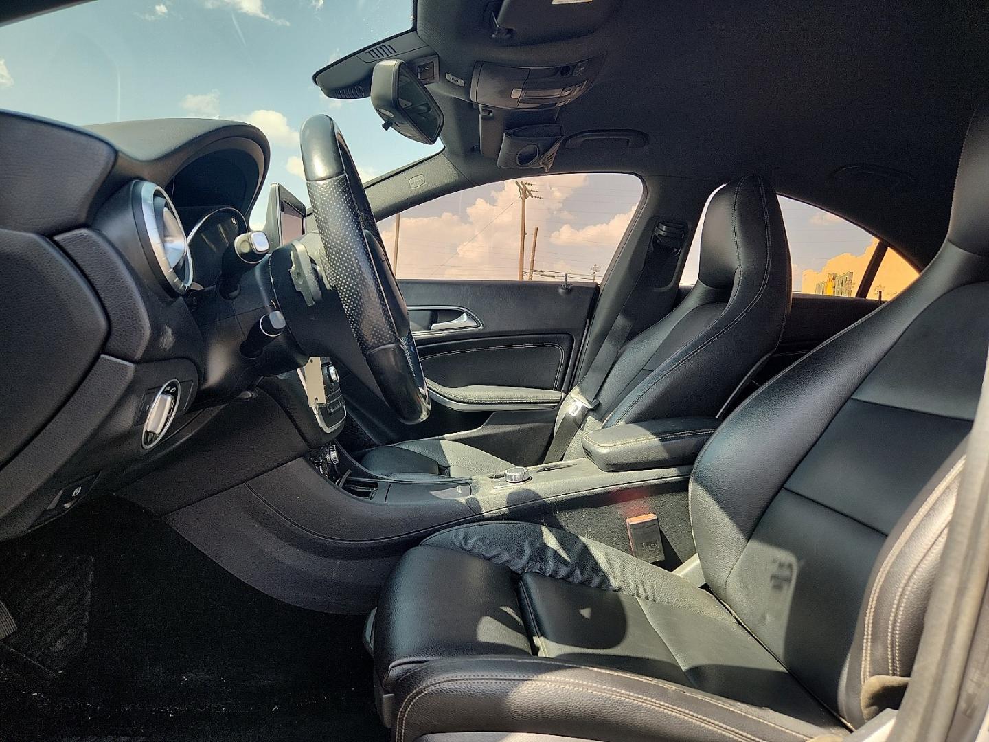 2016 GRAY Mercedes-Benz CLA 250 4MATIC (WDDSJ4GB6GN) with an 2L I-4 direct injection, DOHC, variable valve control, intercooled turbo, premium gasoline, engine with 208HP engine, located at 4711 Ave Q, Lubbock, TX, 79412, (806) 687-2362, 33.551304, -101.855293- Photo#18