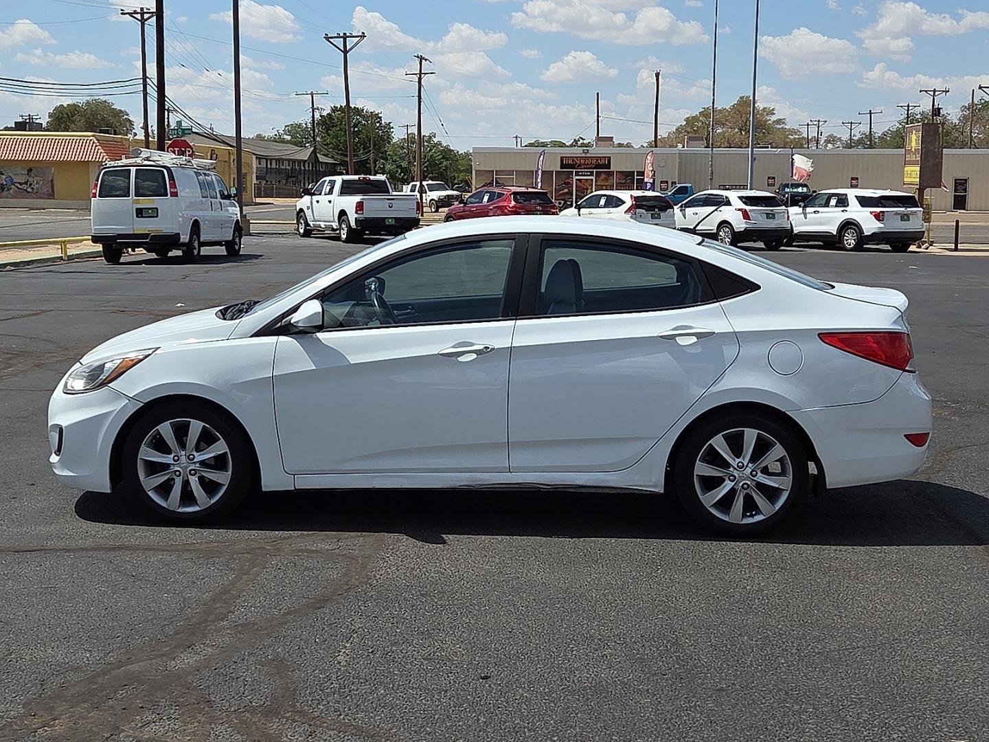 2017 Century White - PGU /Gray - 9Y Hyundai Accent SE (KMHCT4AE1HU) with an 1.6L I-4 direct injection, DOHC, variable valve control, regular gasoline, engine with 137HP engine, located at 4711 Ave Q, Lubbock, TX, 79412, (806) 687-2362, 33.551304, -101.855293- Photo#1