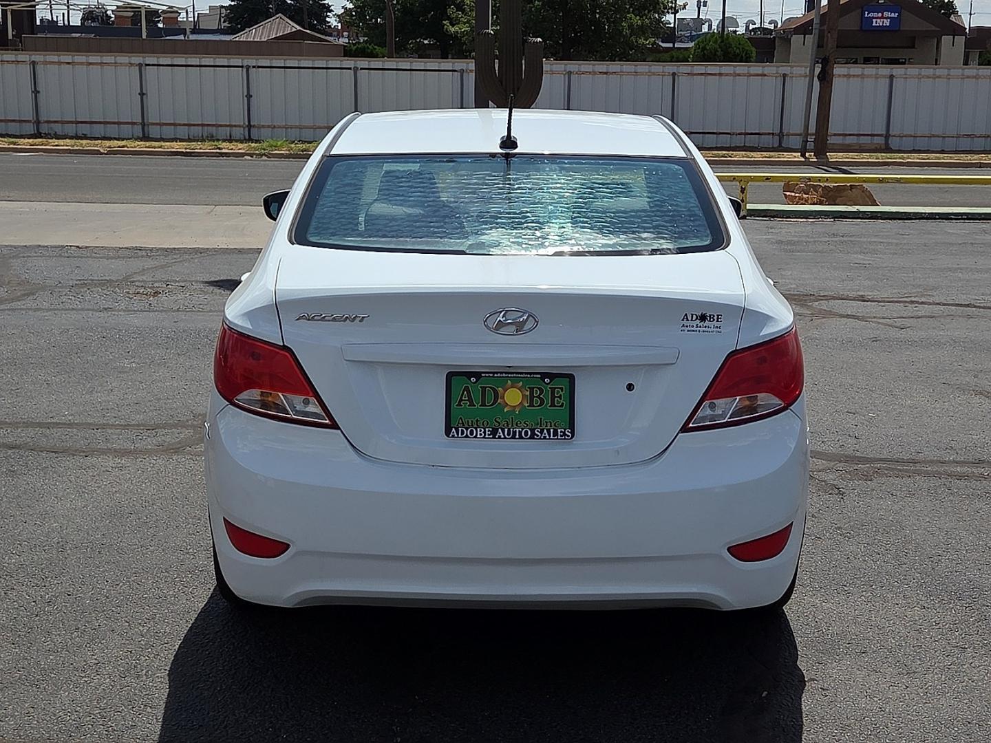 2017 Century White - PGU /Gray - 9Y Hyundai Accent SE (KMHCT4AE1HU) with an 1.6L I-4 direct injection, DOHC, variable valve control, regular gasoline, engine with 137HP engine, located at 4711 Ave Q, Lubbock, TX, 79412, (806) 687-2362, 33.551304, -101.855293- Photo#3