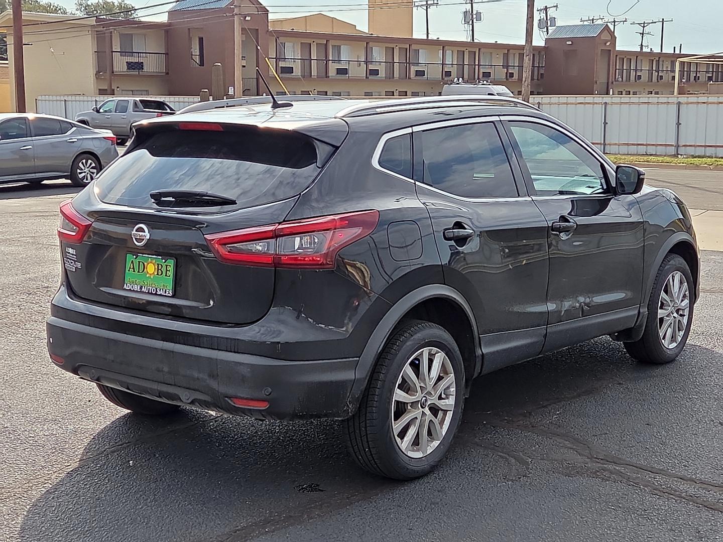 2022 Black /Charcoal - G Nissan Rogue Sport SV FWD Xtronic CVT (JN1BJ1BV6NW) with an 2L I-4 direct injection, DOHC, variable valve control, regular gasoline, engine with 141HP engine, located at 4711 Ave Q, Lubbock, TX, 79412, (806) 687-2362, 33.551304, -101.855293- Photo#4