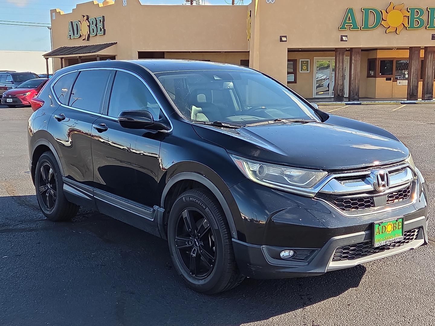 2017 Crystal Black Pearl - BK /Black - BK Honda CR-V EX-L (7FARW1H84HE) with an 1.5L I-4 direct injection, DOHC, variable valve control, intercooled turbo, regular gasoline, engine with 190HP engine, located at 4711 Ave Q, Lubbock, TX, 79412, (806) 687-2362, 33.551304, -101.855293- Photo#6