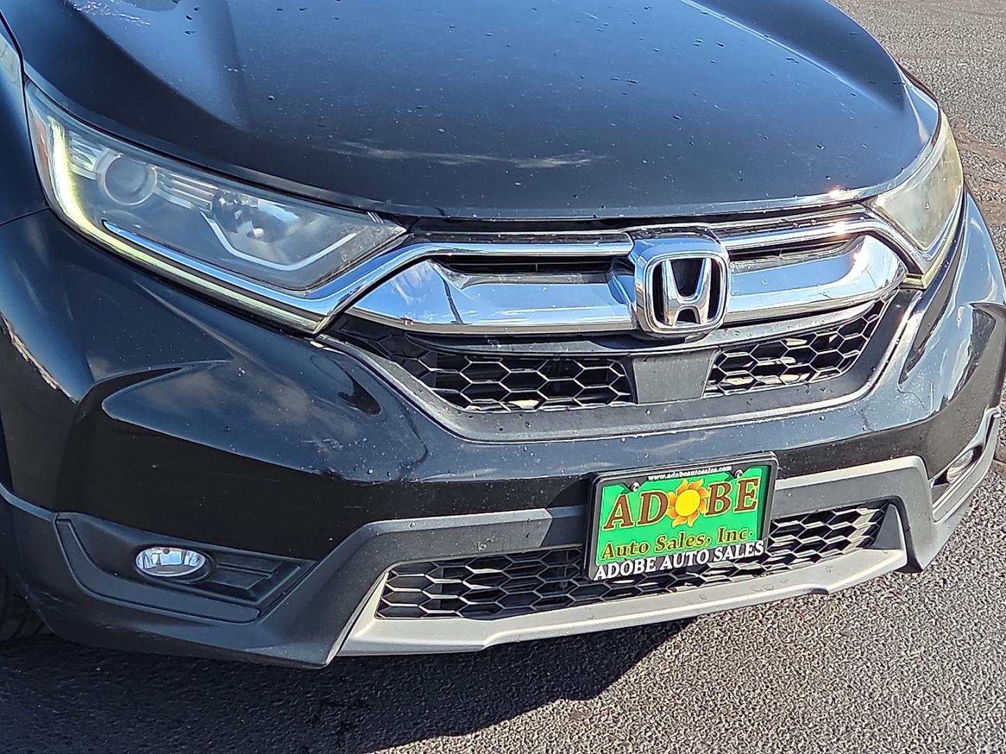 2017 Crystal Black Pearl - BK /Black - BK Honda CR-V EX-L (7FARW1H84HE) with an 1.5L I-4 direct injection, DOHC, variable valve control, intercooled turbo, regular gasoline, engine with 190HP engine, located at 4711 Ave Q, Lubbock, TX, 79412, (806) 687-2362, 33.551304, -101.855293- Photo#8
