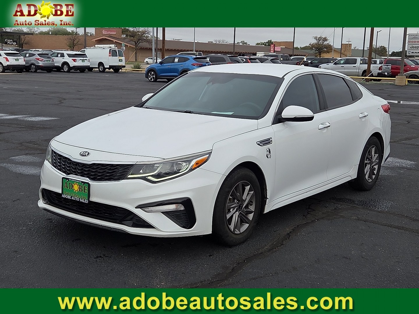2020 Snow White Pearl - SWP /Black - WK Kia Optima LX (5XXGT4L31LG) with an Theta II 2.4L I-4 direct injection, DOHC, D-CVVT variable valve control, regular gasoline, engine with 185HP engine, located at 4711 Ave Q, Lubbock, TX, 79412, (806) 687-2362, 33.551304, -101.855293- Photo#0