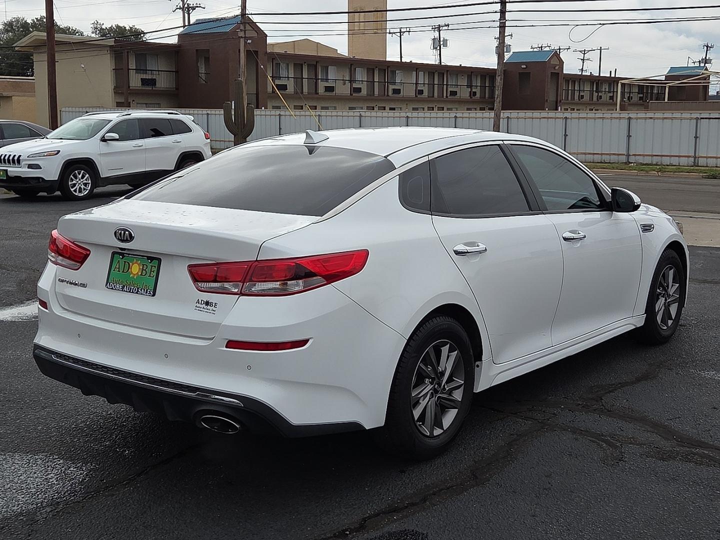 2020 Snow White Pearl - SWP /Black - WK Kia Optima LX (5XXGT4L31LG) with an Theta II 2.4L I-4 direct injection, DOHC, D-CVVT variable valve control, regular gasoline, engine with 185HP engine, located at 4711 Ave Q, Lubbock, TX, 79412, (806) 687-2362, 33.551304, -101.855293- Photo#4