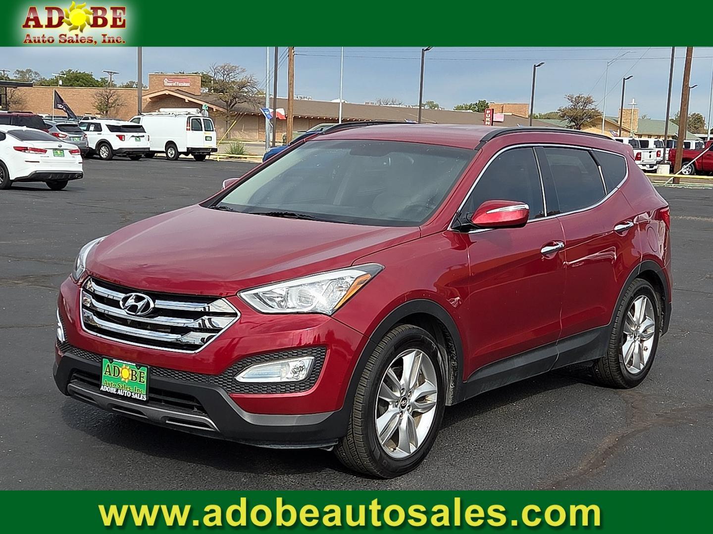 2014 Serrano Red - TR3 /Beige - VYN Hyundai Santa Fe Sport 2.0L Turbo (5XYZU3LA8EG) with an Theta II 2L I-4 direct injection, DOHC, variable valve control, intercooled turbo, regular gasoline, engine with 264HP engine, located at 4711 Ave Q, Lubbock, TX, 79412, (806) 687-2362, 33.551304, -101.855293- Photo#0