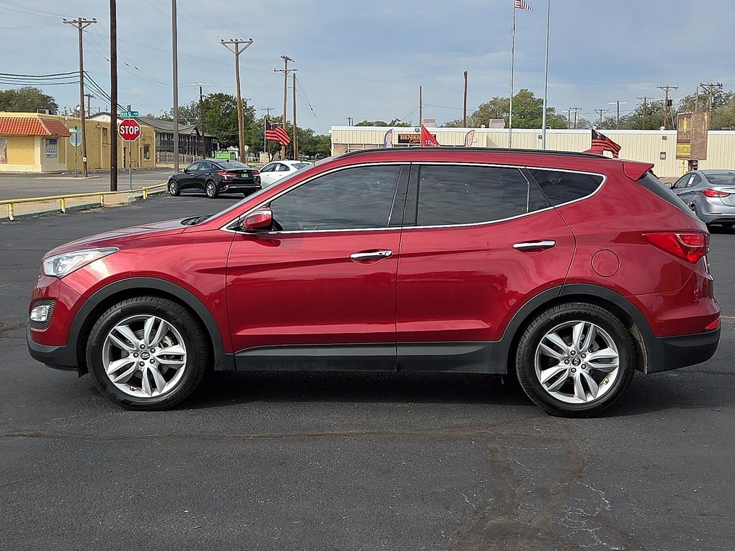 2014 Serrano Red - TR3 /Beige - VYN Hyundai Santa Fe Sport 2.0L Turbo (5XYZU3LA8EG) with an Theta II 2L I-4 direct injection, DOHC, variable valve control, intercooled turbo, regular gasoline, engine with 264HP engine, located at 4711 Ave Q, Lubbock, TX, 79412, (806) 687-2362, 33.551304, -101.855293- Photo#1