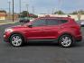 2014 Serrano Red - TR3 /Beige - VYN Hyundai Santa Fe Sport 2.0L Turbo (5XYZU3LA8EG) with an Theta II 2L I-4 direct injection, DOHC, variable valve control, intercooled turbo, regular gasoline, engine with 264HP engine, located at 4711 Ave Q, Lubbock, TX, 79412, (806) 687-2362, 33.551304, -101.855293- Photo#1