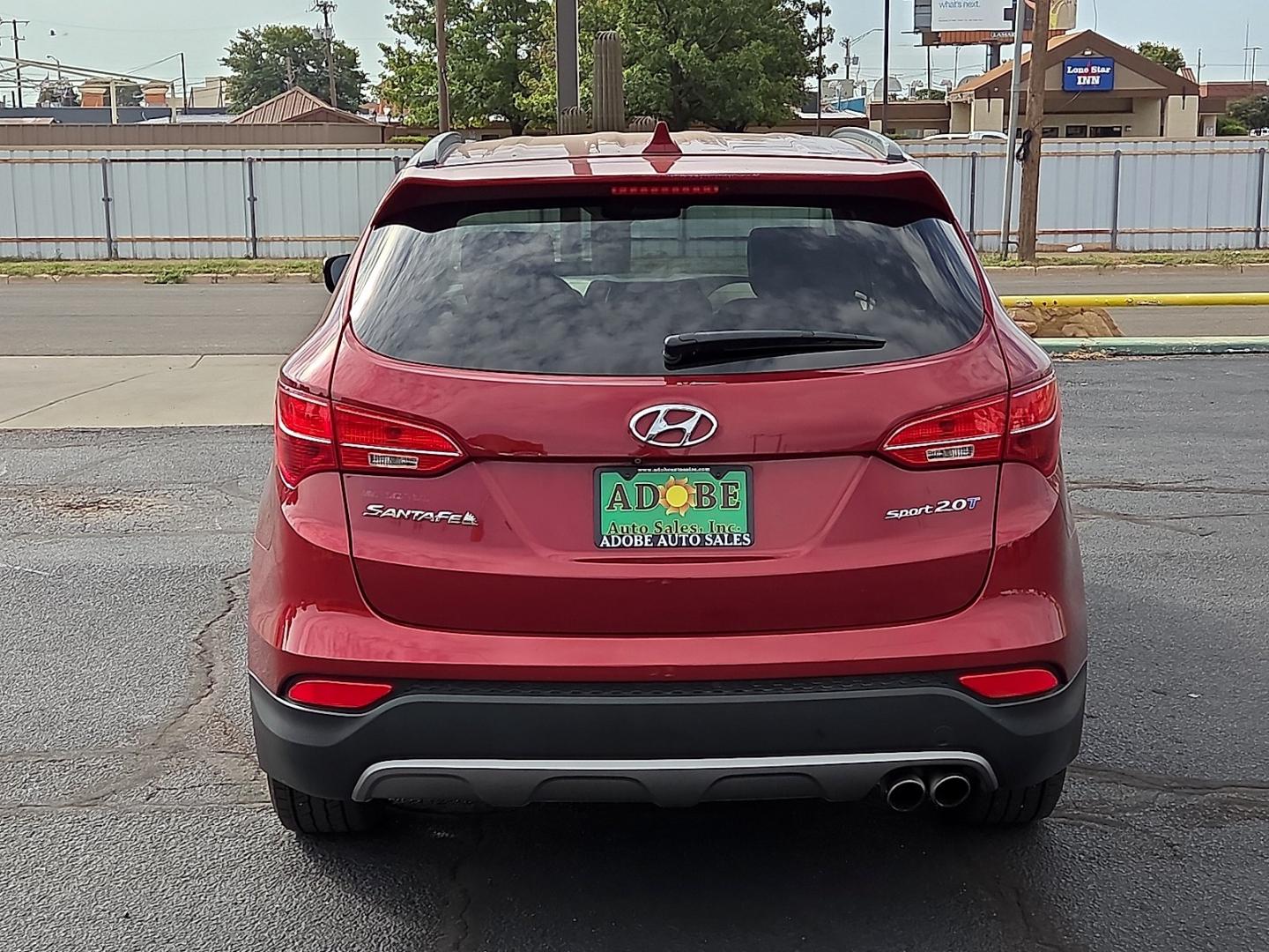 2014 Serrano Red - TR3 /Beige - VYN Hyundai Santa Fe Sport 2.0L Turbo (5XYZU3LA8EG) with an Theta II 2L I-4 direct injection, DOHC, variable valve control, intercooled turbo, regular gasoline, engine with 264HP engine, located at 4711 Ave Q, Lubbock, TX, 79412, (806) 687-2362, 33.551304, -101.855293- Photo#3