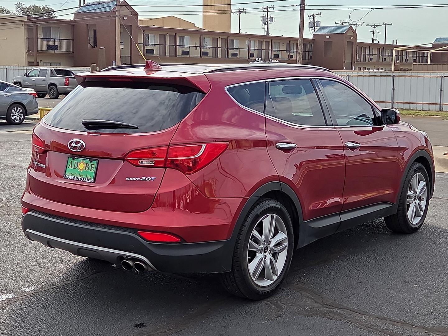 2014 Serrano Red - TR3 /Beige - VYN Hyundai Santa Fe Sport 2.0L Turbo (5XYZU3LA8EG) with an Theta II 2L I-4 direct injection, DOHC, variable valve control, intercooled turbo, regular gasoline, engine with 264HP engine, located at 4711 Ave Q, Lubbock, TX, 79412, (806) 687-2362, 33.551304, -101.855293- Photo#4