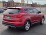 2014 Serrano Red - TR3 /Beige - VYN Hyundai Santa Fe Sport 2.0L Turbo (5XYZU3LA8EG) with an Theta II 2L I-4 direct injection, DOHC, variable valve control, intercooled turbo, regular gasoline, engine with 264HP engine, located at 4711 Ave Q, Lubbock, TX, 79412, (806) 687-2362, 33.551304, -101.855293- Photo#4