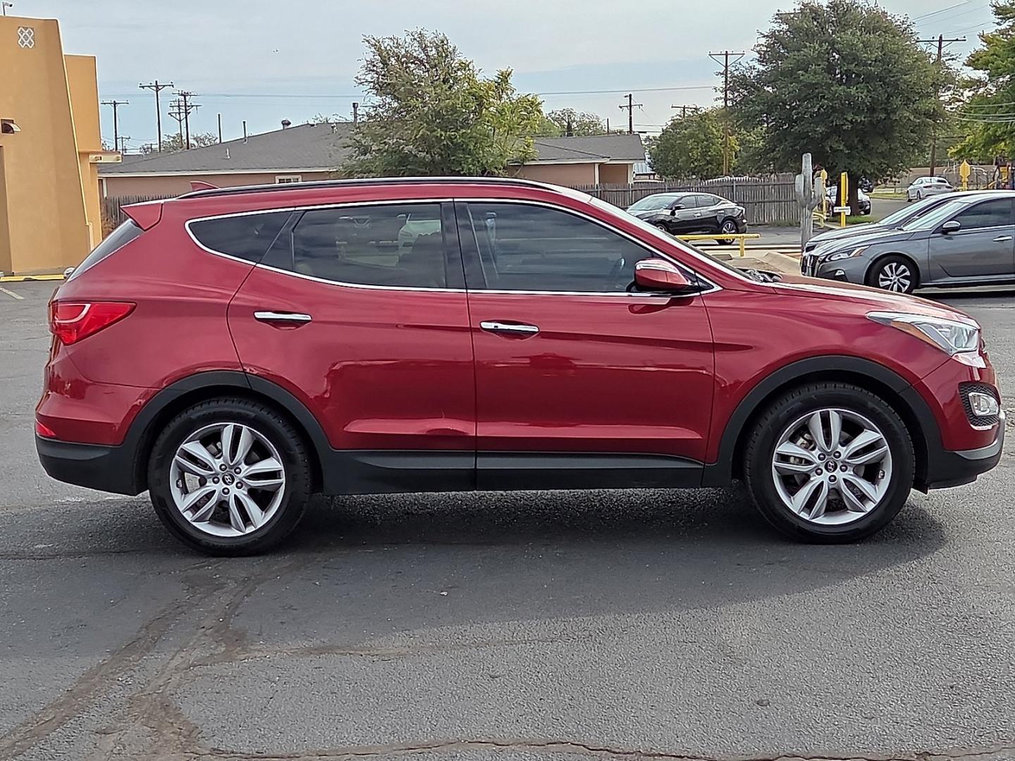 2014 Serrano Red - TR3 /Beige - VYN Hyundai Santa Fe Sport 2.0L Turbo (5XYZU3LA8EG) with an Theta II 2L I-4 direct injection, DOHC, variable valve control, intercooled turbo, regular gasoline, engine with 264HP engine, located at 4711 Ave Q, Lubbock, TX, 79412, (806) 687-2362, 33.551304, -101.855293- Photo#5