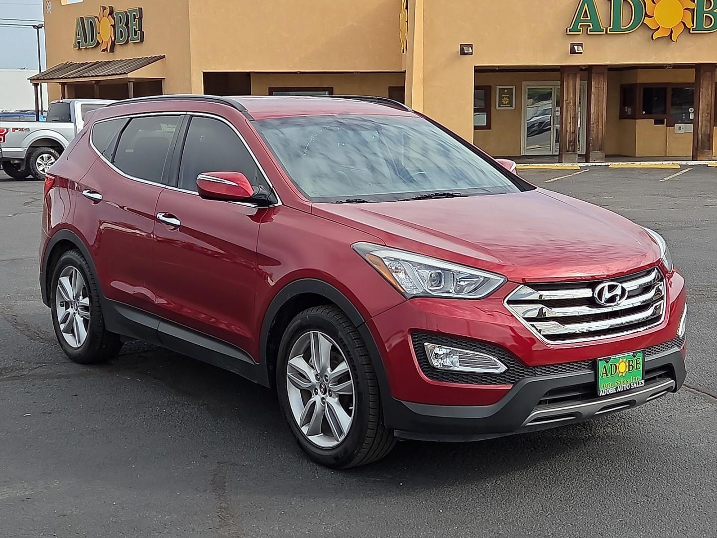 2014 Serrano Red - TR3 /Beige - VYN Hyundai Santa Fe Sport 2.0L Turbo (5XYZU3LA8EG) with an Theta II 2L I-4 direct injection, DOHC, variable valve control, intercooled turbo, regular gasoline, engine with 264HP engine, located at 4711 Ave Q, Lubbock, TX, 79412, (806) 687-2362, 33.551304, -101.855293- Photo#6