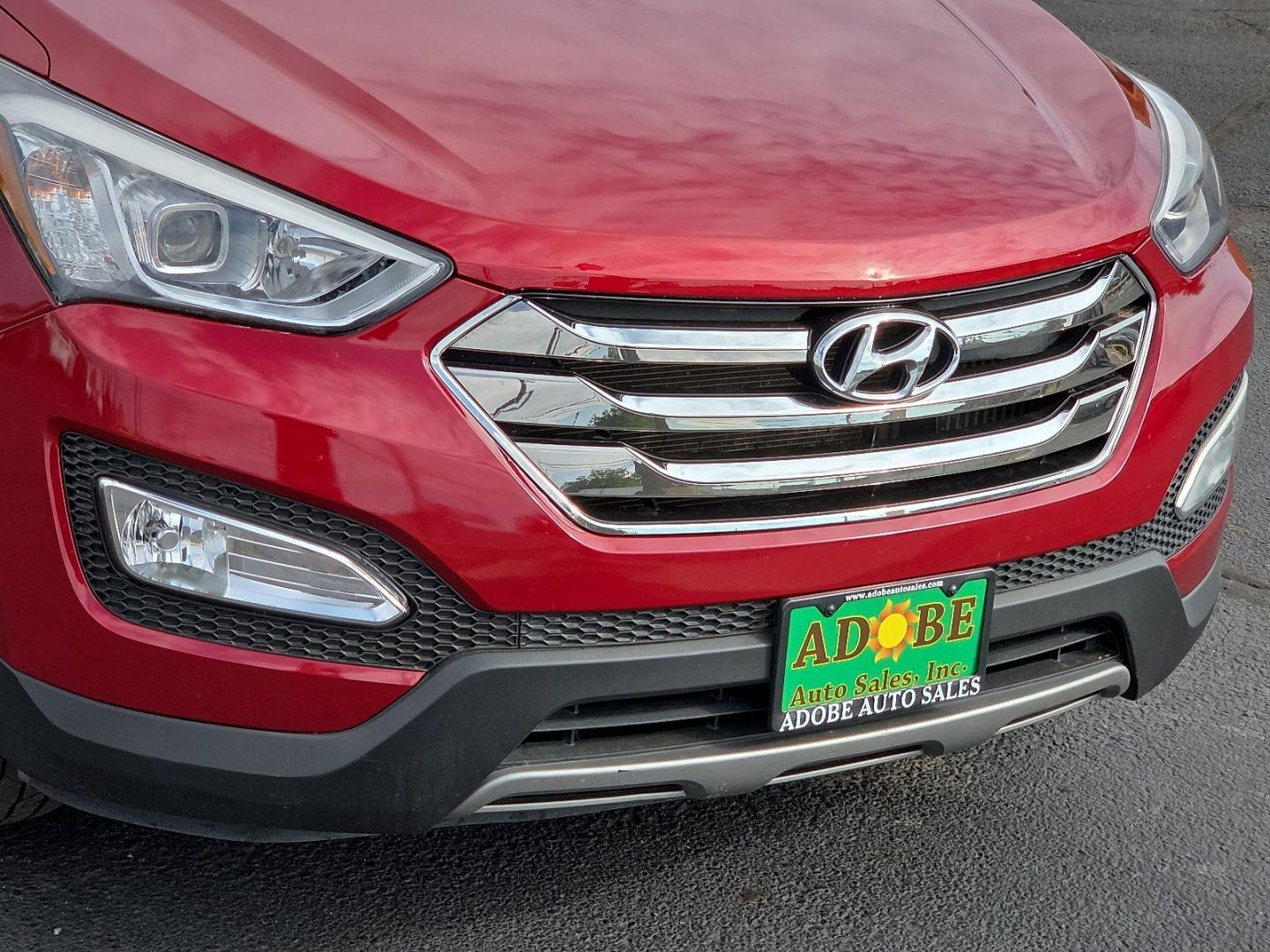 2014 Serrano Red - TR3 /Beige - VYN Hyundai Santa Fe Sport 2.0L Turbo (5XYZU3LA8EG) with an Theta II 2L I-4 direct injection, DOHC, variable valve control, intercooled turbo, regular gasoline, engine with 264HP engine, located at 4711 Ave Q, Lubbock, TX, 79412, (806) 687-2362, 33.551304, -101.855293- Photo#8
