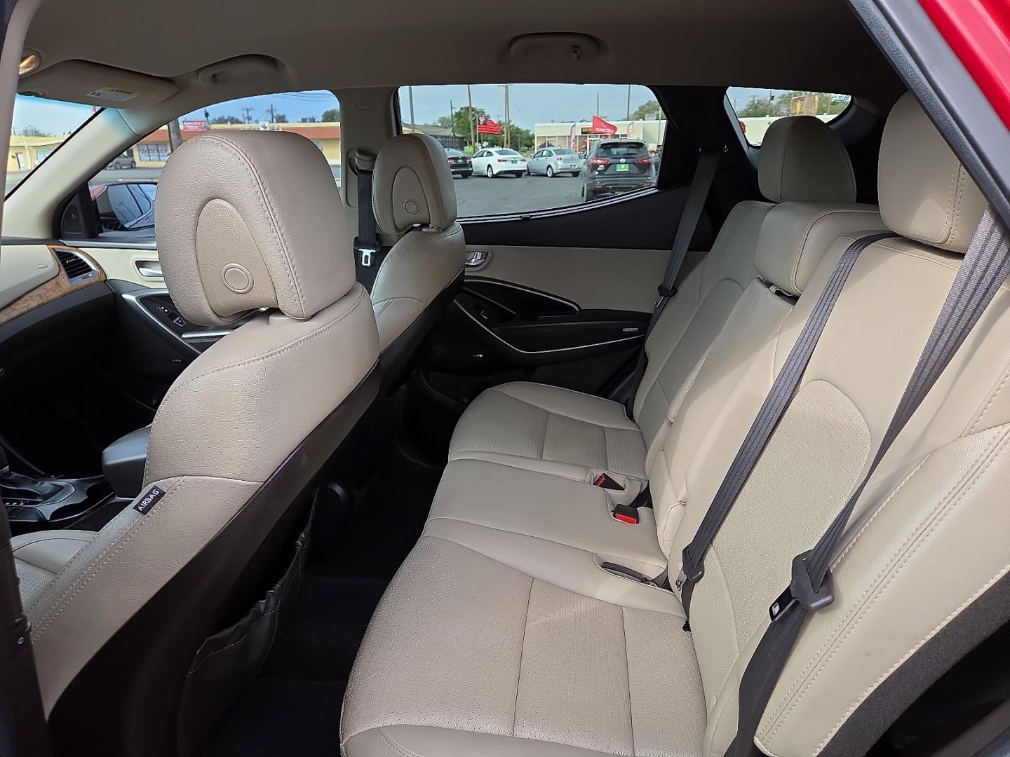 2014 Serrano Red - TR3 /Beige - VYN Hyundai Santa Fe Sport 2.0L Turbo (5XYZU3LA8EG) with an Theta II 2L I-4 direct injection, DOHC, variable valve control, intercooled turbo, regular gasoline, engine with 264HP engine, located at 4711 Ave Q, Lubbock, TX, 79412, (806) 687-2362, 33.551304, -101.855293- Photo#19