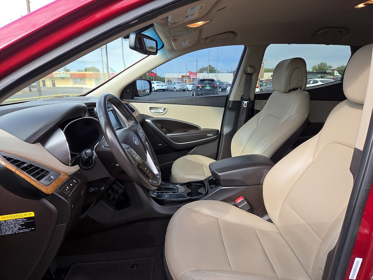 2014 Serrano Red - TR3 /Beige - VYN Hyundai Santa Fe Sport 2.0L Turbo (5XYZU3LA8EG) with an Theta II 2L I-4 direct injection, DOHC, variable valve control, intercooled turbo, regular gasoline, engine with 264HP engine, located at 4711 Ave Q, Lubbock, TX, 79412, (806) 687-2362, 33.551304, -101.855293- Photo#24